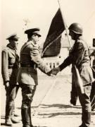 Înmânarea drapelului roşu al U.T.M. Organizaţiei de tineret din Regimentul 36 Artilerie Tg. Jiu, pe stadionul din Craiova. 1950. (1950)