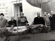 Gh. Gh.-Dej, Petru Groza, C. I. Parhon la mitingul din Piaţa Victoriei, organizat cu prilejul sărbătoririi zilei internaţionale a femeii. În tribună se mai află: Alexandru Moghioroş, Ana Pauker, Vasile Luca, Teohari Georgescu. (8 martie 1950)